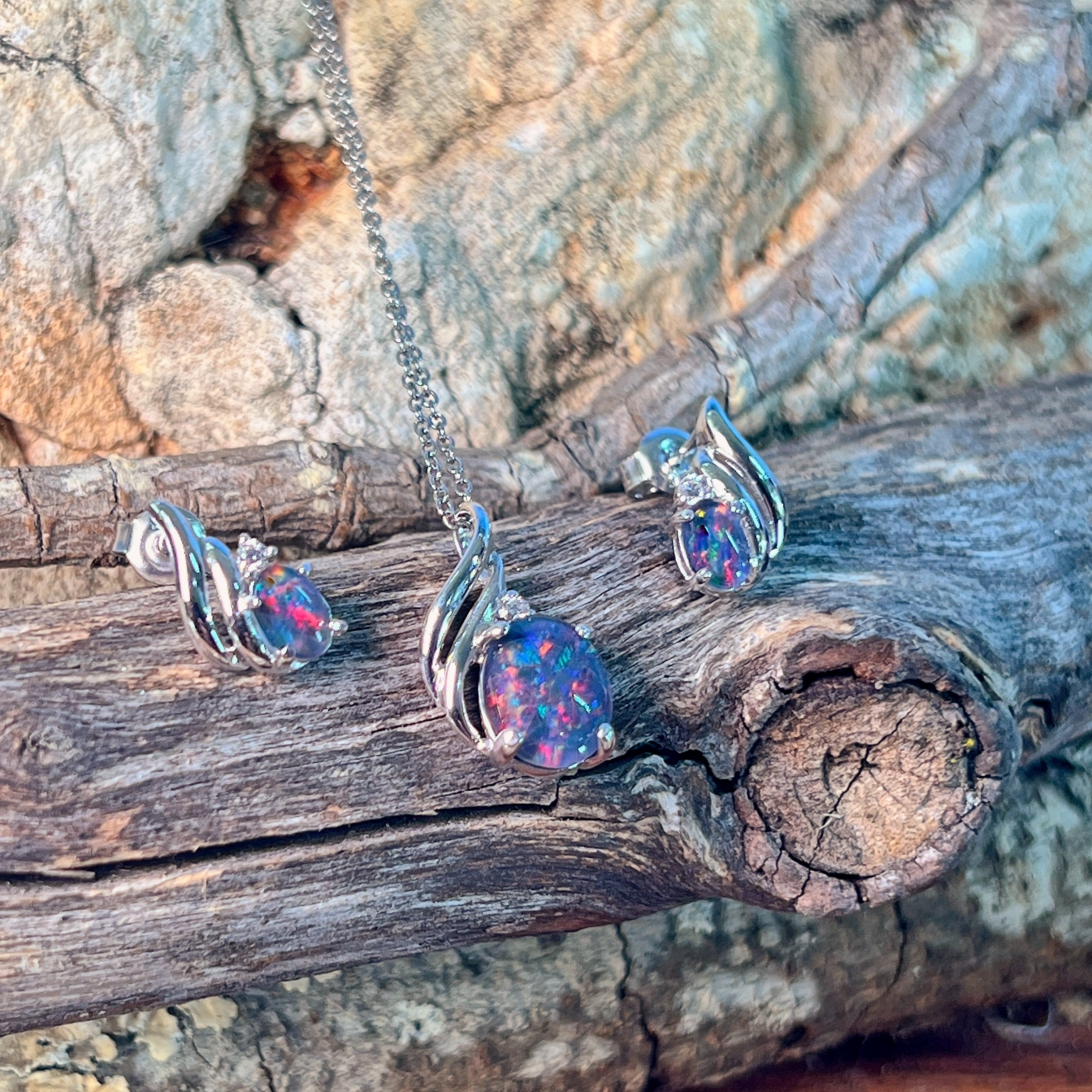 10x8mm oval opal triplet pendant in sterling silver showing blue and pink fire