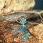 red, blue and green play-of-colour in a 12 x 10mm oval Australian opal triplet ring