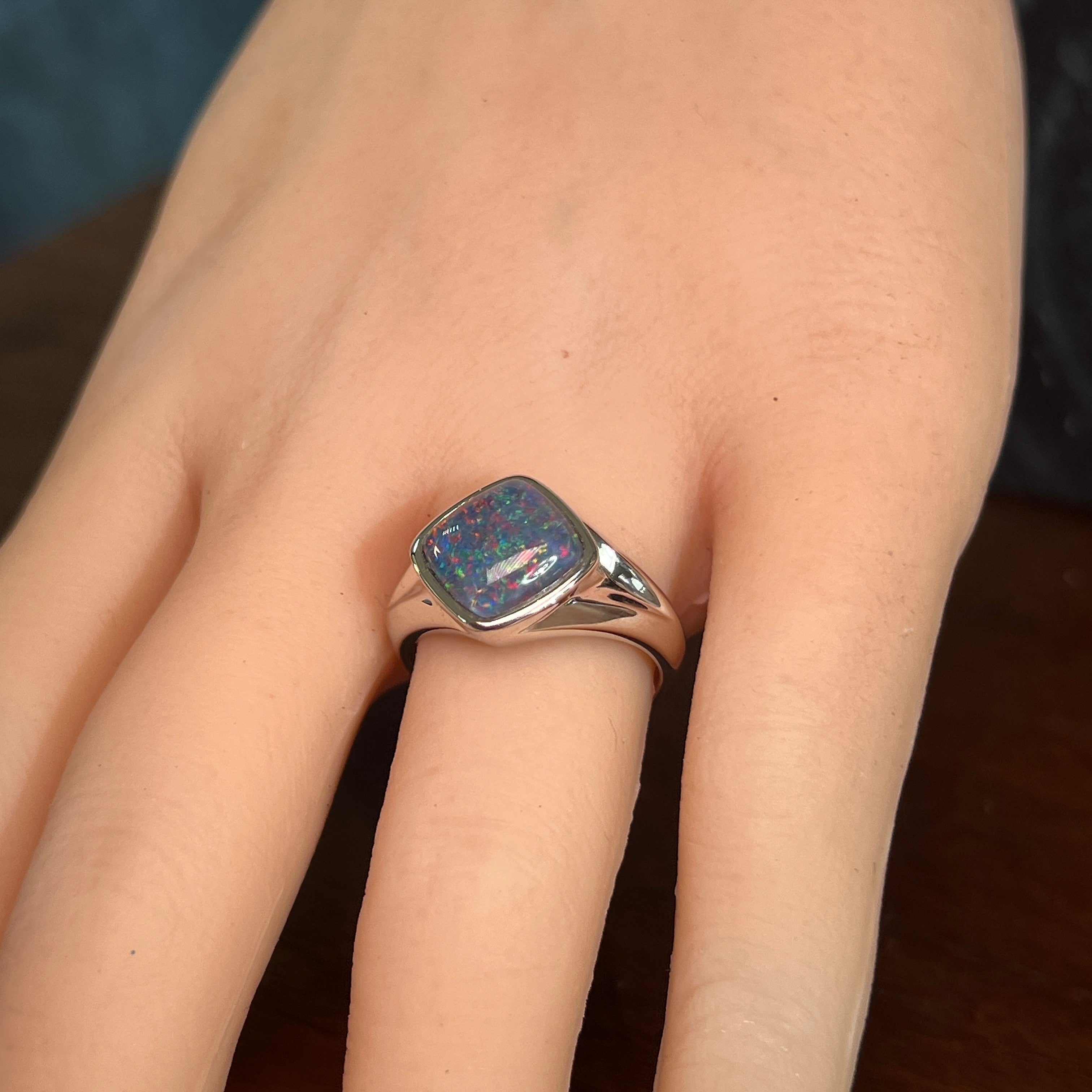 Worn Australian opal triplet ring in sterling silver, red, blue and green, 10 x 10mm