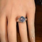 cushion-shaped Australian opal triplet ring worn, sterling silver, red, blue and green