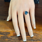 triangular Australian opal triplet ring worn, sterling silver, blue and green