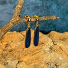 green and blue play-of-colour in 22 x 5.5mm pear-shaped Australian opal doublet earrings